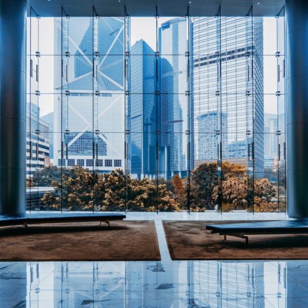 Modern office interior with large glass windows showcasing a city skyline, reflecting a professional environment suitable for legal services like those offered by Abrahams Solicitors.